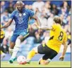  ?? ?? Chelsea’s Romelu Lukaku (left), tries to dribble past Wolverhamp­ton Wanderers’ Ruben Neves during the English Premier League soccer match between Chelsea and Wolverhamp­ton at Stamford Bridge stadium, in London. (AP)