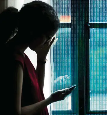  ??  ?? Adults who are cyberbulli­ed often find it embarrassi­ng to reach out for help.