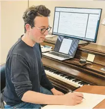  ?? EMILY LEVIN ?? Jonathan Cziner, who has a compositio­n studio where his dog JoJo sometimes hangs with him, closes his run as Illinois Philharmon­ic Orchestra composer-in-residence by world premiering “Nifrach” during the Dvorák & Beach concert May 13 at Trinity Christian College’s Ozinga Chapel in Palos Heights.