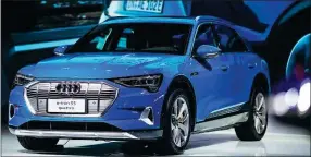  ??  ?? The Audi e-tron makes its debut at the expo — it is the carmaker’s first fully-electric production vehicle.