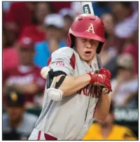  ?? NWA Democrat-Gazette/BEN GOFF ?? Arkansas left fielder Heston Kjerstad turns away as he is hit by a pitch during the second inning of the Razorbacks’ victory over Southern Miss on Saturday. Kjerstad scored later in the inning on an RBI single by center fielder Dominic Fletcher.