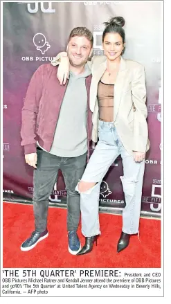  ??  ?? President and CEO OBB Pictures Michael Ratner and Kendall Jenner attend the premiere of OBB Pictures and go90’s ‘The 5th Quarter’ at United Talent Agency on Wednesday in Beverly Hills, California. — AFP photo