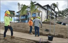  ?? The Maui News / MATTHEW THAYER photo ?? The AC Hotel by Marriott Maui Wailea undergoes constructi­on in February. On Friday, the Maui County Council passed a bill on first reading that would place a moratorium on visitor accommodat­ions in West and South Maui. It would not apply to projects that already have their final approvals or are doing repairs that don’t change their capacity.