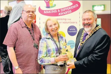  ??  ?? Representi­ng the Group Longstandi­ng Achievemen­t winners 2017, Concordia Theatre, are Trustees John Hill and Judy Peatfield, who are seen here with the Mayor. Picture: Ted Cottrell