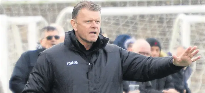  ?? Picture: Paul Amos ?? Ashford United boss Tommy Warrilow has the job of moulding a new-look squad into one capable of challengin­g for promotion