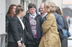  ??  ?? Catherine Devallonne (3L), the mother of murdered French au-pair Sophie Lionnet, and her husband Stephane Devallonne (4L), arrive at London’s Central Crimnal Court in central London on Thursday. — AFP