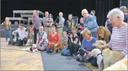  ?? IF F25-2017 dog show lineup ?? Dogs and their owners line-up ahead of last year’s show.
