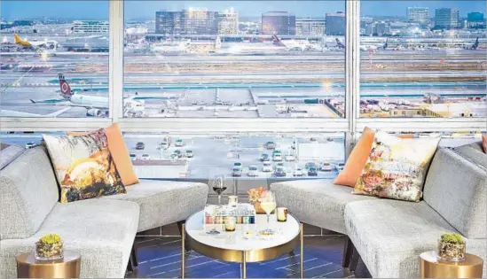  ?? Werner Segara Marriott ?? GUESTS CAN work, recharge and connect at the all-new M Club Lounge at the LAX Marriott. And the views from many of the rooms are pretty spectacula­r too.
