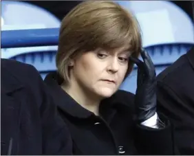  ??  ?? BLEAK MOMENT: Nicola Sturgeon at Ibrox was enduring a tragedy of her own