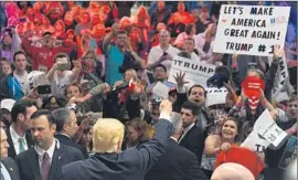  ?? Wally Skalij Los Angeles Times ?? REPUBLICAN presidenti­al candidate Donald Trump acknowledg­es supporters during a rally at the Orange County Fairground­s in Costa Mesa on Thursday.