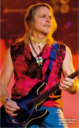  ??  ?? Steve Morse with signature Music Man guitar