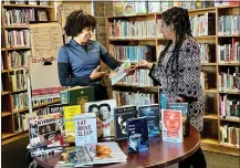  ?? COURTESY PHOTO ?? Karen Scott, left, First 5San Bernardino executive director, and Gwen Dowdy-rodgers, First 5San Bernardino commission­er, deliver more than 100books from the personal library of the late Margaret Hill to the Dorothy Inghram Branch Library in San Bernardino in February.