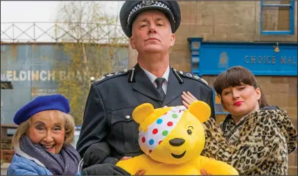  ??  ?? River City’s Scarlett Mullen (Sally Howitt) and Molly O’Hara (Una McLean) join Scot Squad’s Chief Commission­er Cameron Miekelson (Jack Docherty) for a comedy sketch to raise cash for the BBC Children In Need telethon tomorrow