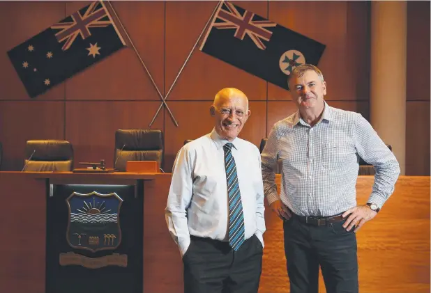  ?? Picture: BRENDAN RADKE ?? DYNAMIC DUO: Cairns Regional Council Mayor Bob Manning with executive manager Neil Quinn who has announced his retirement to focus on his cattle operation at Malanda after five years as the mayor’s right-hand man.