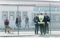  ?? — AFP ?? Turkish soldiers guard at the Sincan Prison in Ankara on Tuesday during the trial of suspects accused of involvemen­t in last year’s failed July coup in Turkey.