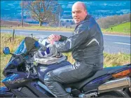  ??  ?? Motorcycli­st Garry Joiner on his Honda VFR bike