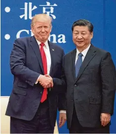  ??  ?? Lobende Worte hatte US Präsident Donald Trump für seinen Gastgeber und chinesi schen Amtskolleg­en Xi Jinping.