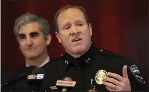  ?? (AP/Hasan Jamali) ?? Burlington Police Chief Jon Murad speaks at a news conference with Mayor Miro Weinberger (left) in Burlington, Vt., on Monday.