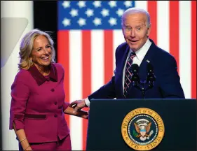  ?? MATT ROURKE / ASSOCIATED PRESS ?? President Joe Biden and first lady Jill Biden stand on stage Jan. 5 after Biden spoke in Blue Bell, Pa. The first lady says her husband’s age is an “asset,” as the president faces persistent questions from voters about his decision to seek another term at age 81. Joe Biden already is the oldest American leader in history.