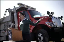  ?? CHARLIE RIEDEL — THE ASSOCIATED PRESS ?? U.S. Rep. Sharice Davids, D-Kan., talks to the media during a news conference at a Kansas Department of Transporta­tion facility in Stilwell, Kan., on Tuesday to talk about the recently passed $1.2trillion infrastruc­ture bill.