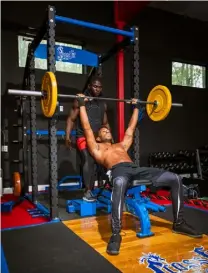  ??  ?? LUDACRIS AND HIS TRAINER, GEORGE BAMFO, KEEP THEIR TRAINING DAYS HARD AND FAST