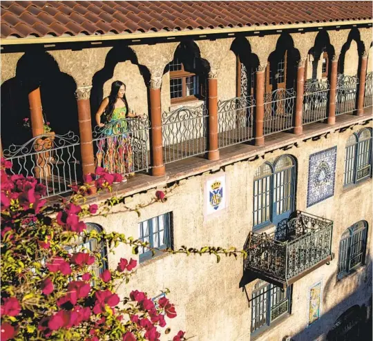  ?? GINA FERAZZI LOS ANGELES TIMES ?? Lily Yu, a deaf travel influencer on social media who has made traveling a side career, takes in the view overlookin­g the Spanish patio at the Mission Inn in Riverside.