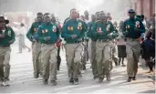  ??  ?? ON THE MARCH: Youth training (Source: Zimbabwe Voice)