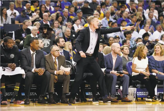  ?? Santiago Mejia / The Chronicle ?? Steve Kerr coaches the Warriors during their loss to New Orleans in Oakland on April 7. The Warriors have struggled with injuries and complacenc­y all year.