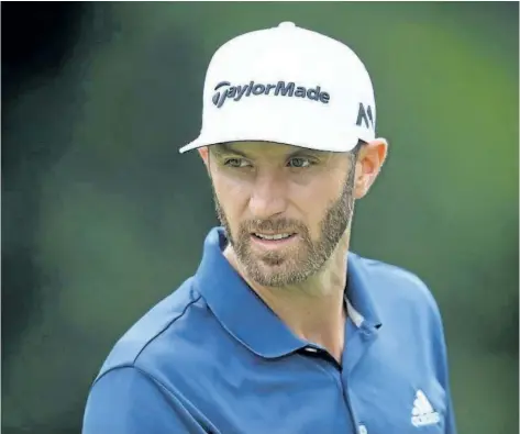  ?? WARREN LITTLE/GETTY IMAGES ?? Dustin Johnson on the course during a practice round on Tuesday prior to the 2017 PGA Championsh­ip at Quail Hollow Club in Charlotte, N.C.