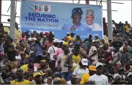  ?? SUNDAY ALAMBA — THE ASSOCIATED PRESS ?? Supporters of Bola Ahmed Tinubu, presidenti­al candidate of the All Progressiv­es Congress, participat­e in an election campaign rally at the Teslim Balogun Stadium in Lagos, Nigeria, on Tuesday.