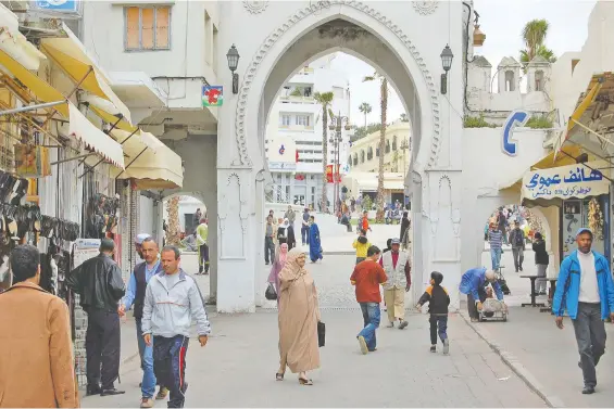  ?? RICK STEVES ?? A gate in Tangier's old town reveals an amazing city that has been restored and revived. It is best toured with a private guide to take in rooftop tea houses and avoid tourist traps.