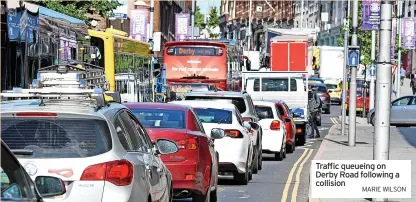  ?? MARIE WILSON ?? Traffic queueing on Derby Road following a collision