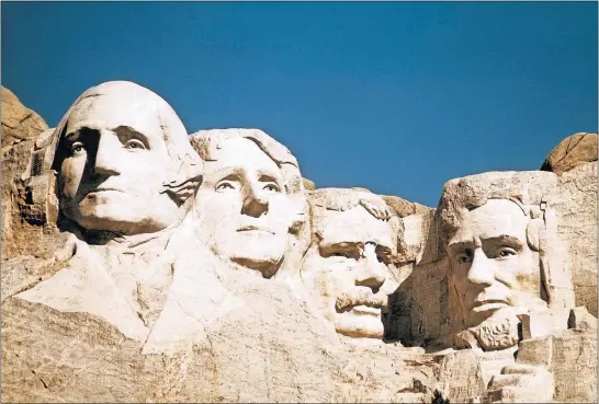  ?? [AP PHOTO/FILE] ?? From left: The faces of George Washington, Thomas Jefferson, Teddy Roosevelt and Abraham Lincoln at Mount Rushmore in South Dakota.