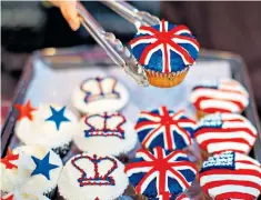  ??  ?? Cupcakes decorated to mark the wedding of Prince Harry and Meghan Markle in May