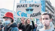  ?? AFP VIA GETTY IMAGES ?? Protesters take part in a demonstrat­ion against climate change in Brussels ahead of the COP26 climate summit.