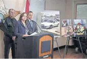  ?? PHOTO] [AP ?? Flanked by Palm Beach County Sheriff Ric Bradshaw, left, and Palm Beach County State Attorney Dave Aronberg, PBSO detective Paige McCann speaks to reporters Thursday during a news conference at the Palm Beach County Sheriff’s Office in West Palm Beach,...