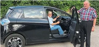  ??  ?? Opening the door to future of driving: Tom Tyler with his wife Tricia