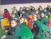  ?? ANI ?? ■
Children attend a school in Srinagar on Monday.