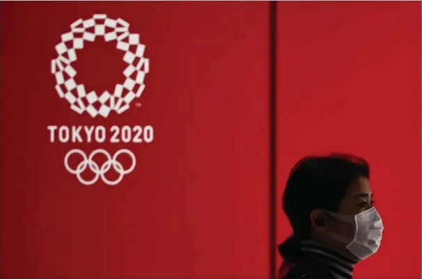  ??  ?? 82 pct. af japanerne mener, at OL bør udskydes
– eller helt aflyses.
Foto: Charly Triballeau/AFP