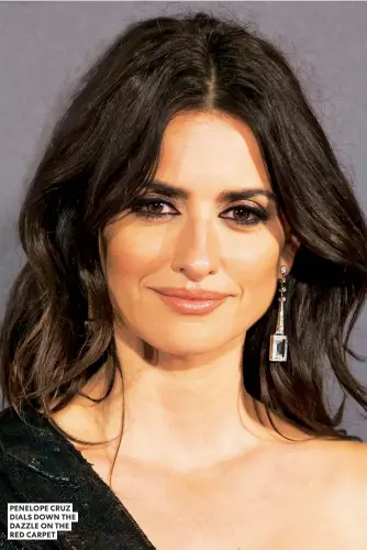  ??  ?? PENELOPE CRUZ DIALS DOWN THE DAZZLE ON THE RED CARPET