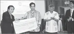  ??  ?? dr Jerip (left) symbolical­ly presents rM20,000 for the annual conference to ahmad hata. also seen are Fadzil (second right) and organising chairman Mohd azrul Syafiq.