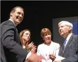  ?? GEORGE BENNETT / THE PALM BEACH POST ?? Gubernator­ial candidate Chris King (from left) with wife Kristen, candidate Gwen Graham and her father, ex-Florida Gov. and Sen. Bob Graham, after Monday’s debate.