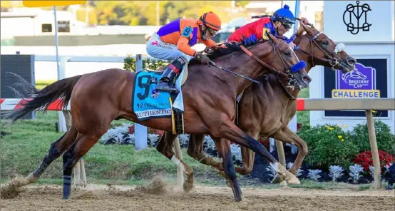  ?? Nick Wass/ Associated Press ?? Authentic, left, ridden by John Velazquez, is edged out by Swiss Skydiver, ridden by Robby Albarado, who won the 145th Preakness Stakes horse race on Oct. 3 at Pimlico Race Course in Baltimore.