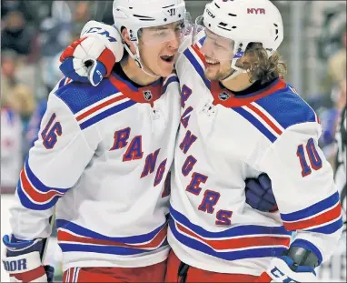  ?? AP ?? YOU AGAIN! On the first day of camp, coach David Quinn kept 2020 linemates Ryan Strome and Artemi Panarin together hoping their history could make up for a lack of practice time before the season.