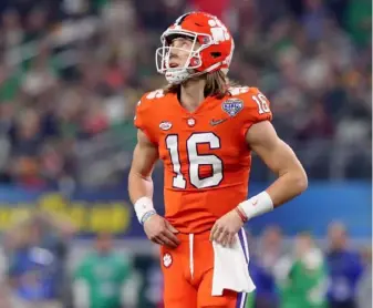  ?? Tom Pennington/Getty Images ?? A state senator in South Carolina would like for Clemson quarterbac­k Trevor Lawrence to be able to benefit from his name, image and likeness.