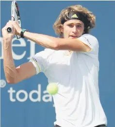  ??  ?? Alexander Zverev returns a shot to Tiafoe during Day 5 of the Western & Southern Open at the Linder Family Tennis Centre in Mason, Ohio in this Aug 16 file photo. — AFP photo