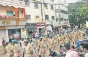  ?? HT ?? Police personnel and CRPF jawans maintained a strict vigil to keep the law and order situation under control on Tuesday in Chakan, which is limping back to normalcy after the violent protests on Monday.