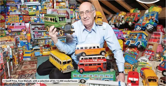  ??  ?? > Geoff Price, from Walsall, with a selection of his 15,000 model buses