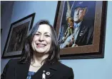  ?? JESSICA HILL / AP ?? Marilynn Malerba, standing next to a photograph of late Chief Ralph Sturges at Tribal offices in Uncasville, Conn., was nominated Tuesday to be U.S. treasurer in a historic first.