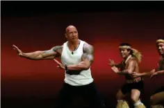 ?? ?? Dwayne Johnson and dancers perform onstage for ‘Moana 2.’